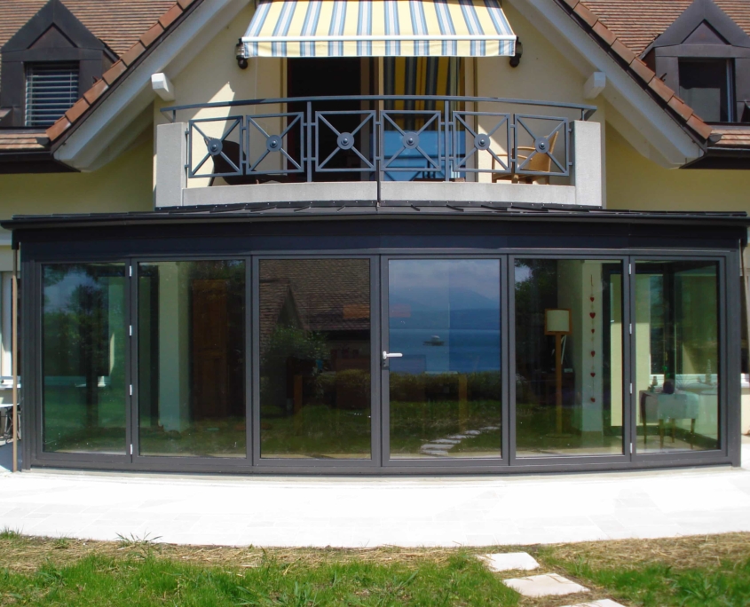 Villa St Prex Véranda Accordéon Profilé Alu Schüco Thermpolaqué En Facette Construction Métallique Adani